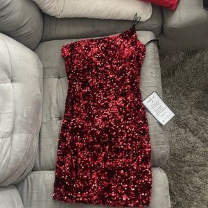 Sparkly red one shoulder mini dress